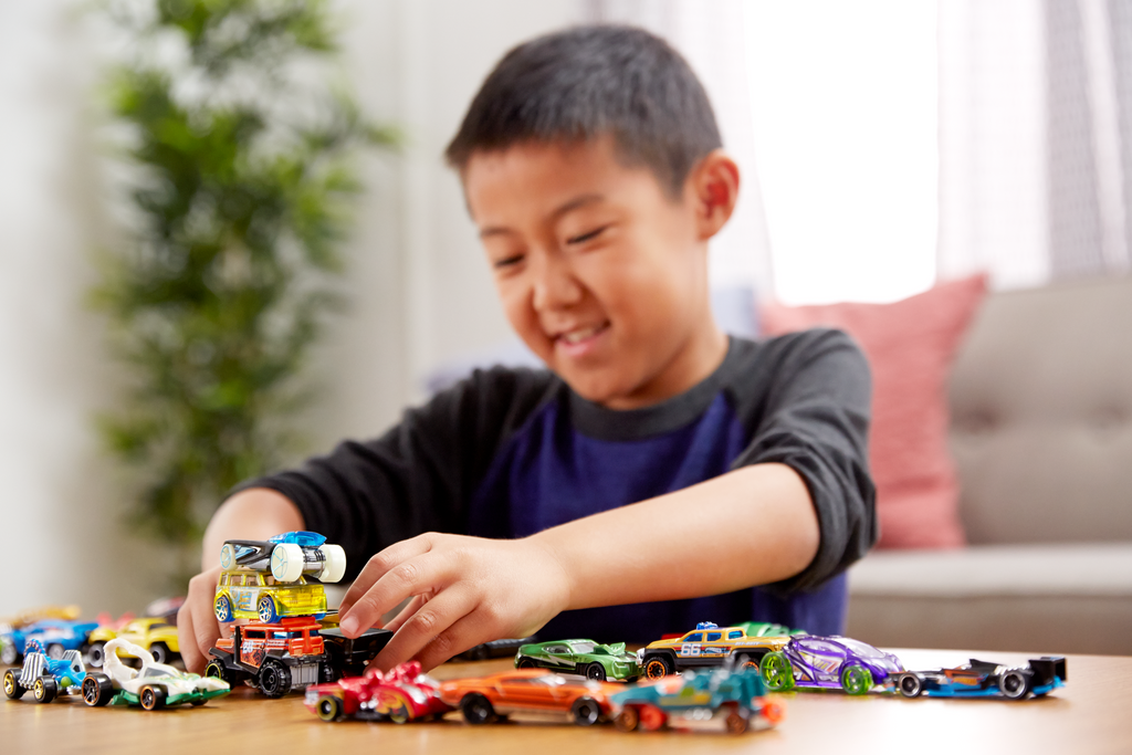 Hot Wheels Set Of 8 Basic Toy Cars & Trucks in 1:64 Scale Including 1 Exclusive Car, Styles May Vary