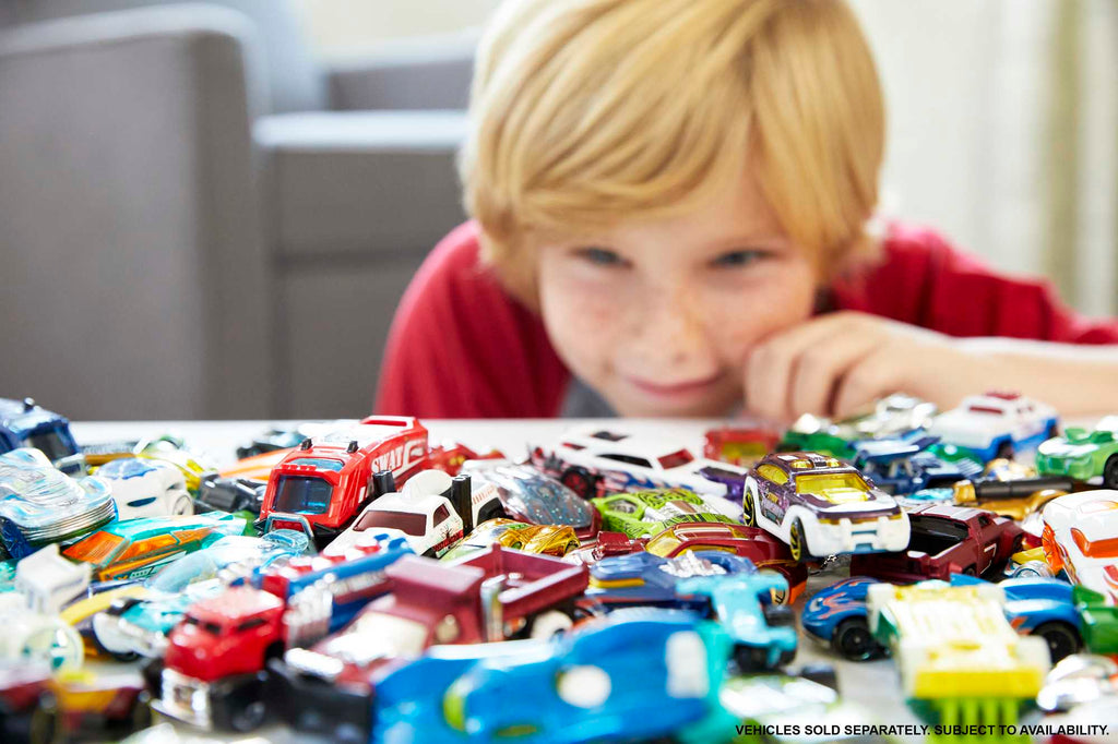 Hot Wheels Set Of 8 Basic Toy Cars & Trucks in 1:64 Scale including 1 Exclusive Car, Styles May Vary
